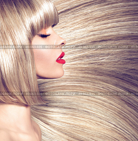 Profile photograph of a woman with long straight haircut. Стоковое фото, агентство Ingram Publishing / Фотобанк Лори