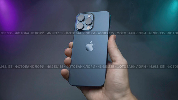 Promotional video of new iPhone model 15 pro max on isolated background with fog (2023 год). Редакционное фото, фотограф David Kashakhi / Фотобанк Лори