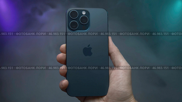 Promotional video of new iPhone model 15 pro max on isolated background with fog (2023 год). Редакционное фото, фотограф David Kashakhi / Фотобанк Лори