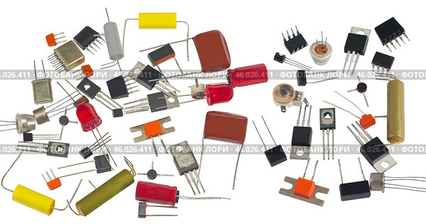 Радиодетали разного типа на белом фоне. Radio components on a white background. Стоковое фото, фотограф Татьяна Д / Фотобанк Лори