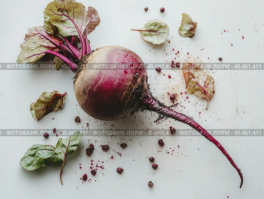 Raw beetroot with leaves and lumps of earth lies on a white background. Стоковое AI-изображение, AI-художник Ярославский Максим / Фотобанк Лори