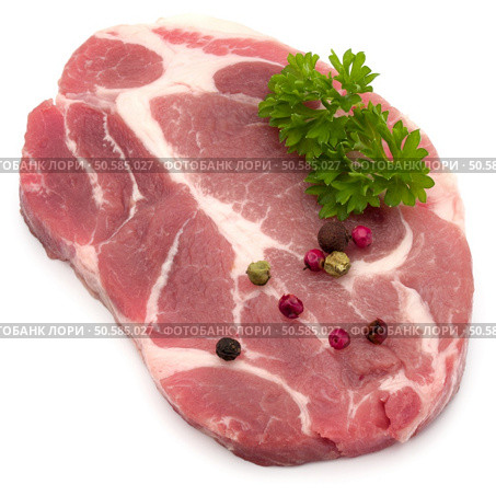 Raw pork neck chop meat with parsley herb leaves and peppercorn spices garnish isolated on white background cutout. Стоковое фото, агентство Ingram Publishing / Фотобанк Лори