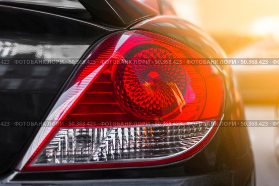 rear light new dark car. Стоковое фото, агентство Ingram Publishing / Фотобанк Лори