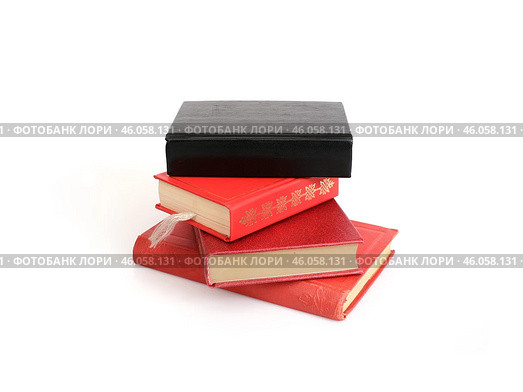 Red and black books isolated on a white background. Стоковое фото, фотограф Елена  Попкова / Фотобанк Лори