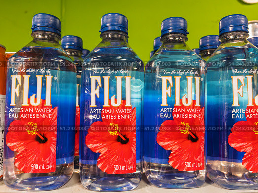Refreshing Bottled Fiji Artesian Water on Display. Стоковое фото, фотограф Sergakoff / Фотобанк Лори