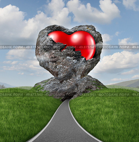 Relationship difficulties with a heart of stone breaking up to expose a red shaped valentine symbol as a diamond in the rough representing challenges of marriage and dating. Стоковое фото, агентство Ingram Publishing / Фотобанк Лори