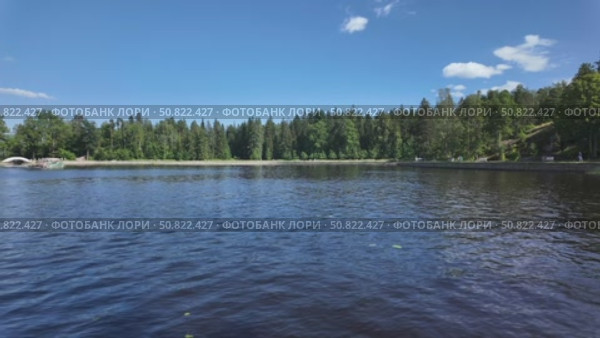 Relaxing summer day on the Vyborg Bay of the Gulf of Finland - Vyborg, Russia, July 15, 2025. Стоковое видео, видеограф Наталия Попова / Фотобанк Лори