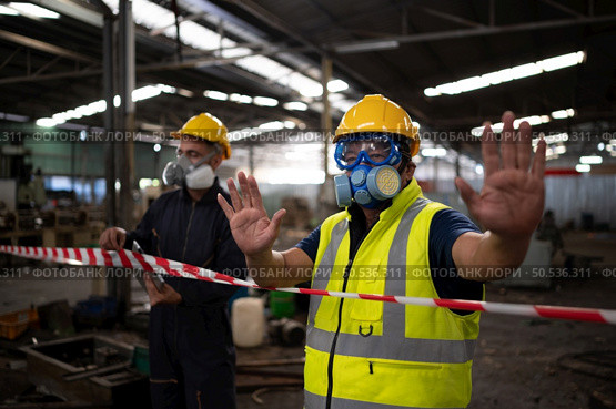 Restricted area, officials employ white and red stripes to block the area where a chemical leak is occurring. To prevent individuals from coming into contact with potentially dangerous chemicals, Стоковое фото, агентство Ingram Publishing / Фотобанк Лори