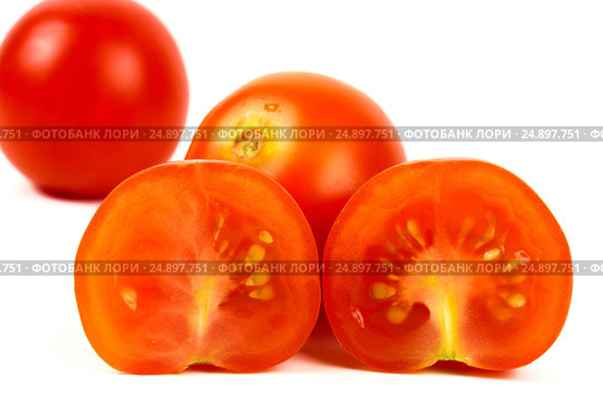 Ripe cherry tomatoes close-up on a white background. Стоковое фото, фотограф Artem Sobov / Фотобанк Лори