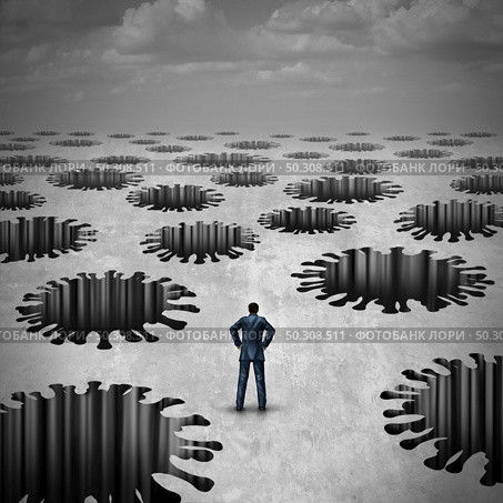 Risk of disease and health pitfall concept as a vulnerable businessman facing risky medical peril as deep holes shaped as an infectious virus with 3D illustration. Стоковое фото, агентство Ingram Publishing / Фотобанк Лори
