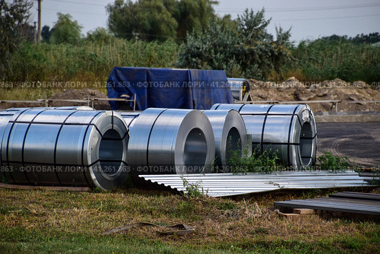 Rolls of sheet metal. Storage of building materials. Стоковое фото, фотограф Леонид Еремейчук / Фотобанк Лори