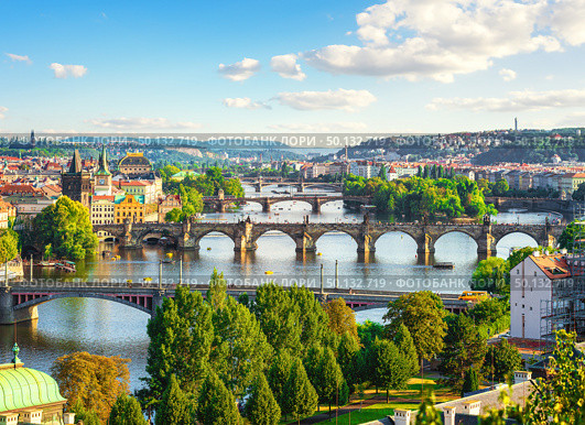 Row of bridges in Prague at summer day. Стоковое фото, агентство Ingram Publishing / Фотобанк Лори