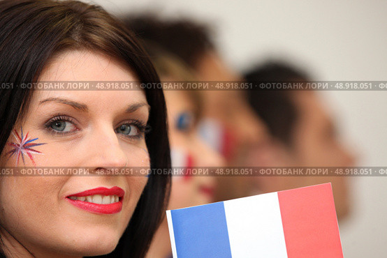 Row of French football supporters. Стоковое фото, агентство Ingram Publishing / Фотобанк Лори