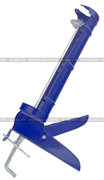 Ручной монтажный пистолет для клея на белом фоне. Silicone glue gun, isolated on white background. Стоковое фото, фотограф Татьяна Д / Фотобанк Лори