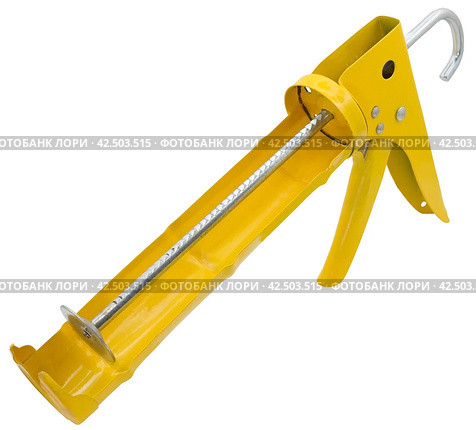 Ручной монтажный пистолет для клея на белом фоне. Silicone glue gun, isolated on white background. Стоковое фото, фотограф Татьяна Д / Фотобанк Лори