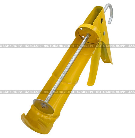 Ручной монтажный пистолет для клея на белом фоне. Silicone glue gun, isolated on white background. Стоковое фото, фотограф Татьяна Д / Фотобанк Лори