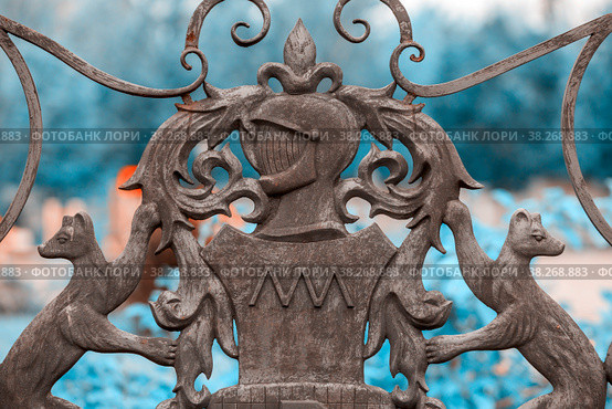 Russia, Sverdlovsk region, July 2021: Coat of arms of the Demidovs on the fence around the Nevyansk tower. Редакционное фото, фотограф Акиньшин Владимир / Фотобанк Лори