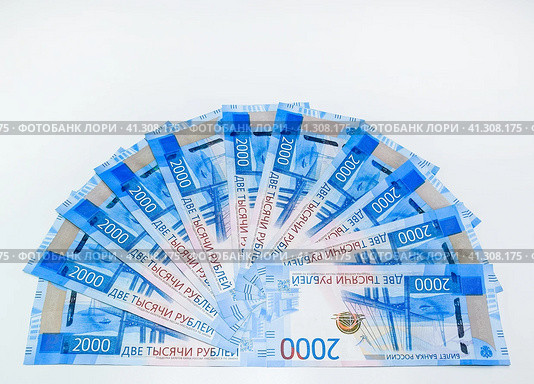 Russian money banknotes in nominal value of two thousand. New tickets of the bank of Russia. Russian money. Стоковое фото, фотограф Леонид Еремейчук / Фотобанк Лори