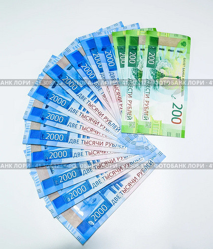 Russian new denominations of 2000 and 200 rubles. Russian banknotes. Russian money is ruble. Стоковое фото, фотограф Леонид Еремейчук / Фотобанк Лори