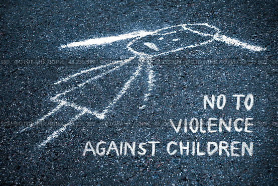 Sad child painted chalk on the asphalt with the inscription: no to violence against children (concept, toned) Стоковое фото, фотограф Михаил Строгалев / Фотобанк Лори