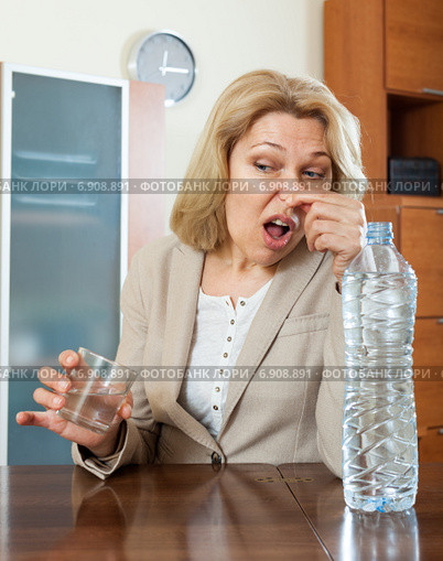 Sad mature woman with poor quality water. Стоковое фото, фотограф Яков Филимонов / Фотобанк Лори