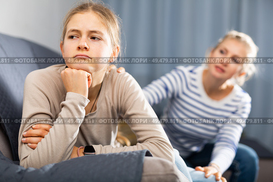 Sad teen girl after discord with her mother. Стоковое фото, фотограф Яков Филимонов / Фотобанк Лори