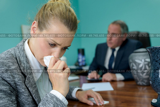 sad widow dealing with paperwork in an office. Стоковое фото, агентство Ingram Publishing / Фотобанк Лори