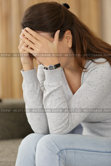 sad woman suffering from the stomachache. Стоковое фото, агентство Ingram Publishing / Фотобанк Лори