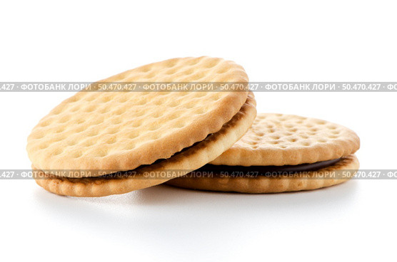 Sandwich biscuits with chocolate filling on a white background. Стоковое фото, агентство Ingram Publishing / Фотобанк Лори