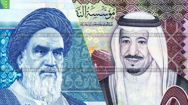 Saudi Arabia Riyal banknote with King Salman and Iranian rial banknote with Ayatollah Khomeini. Стоковое фото, фотограф FotograFF / Фотобанк Лори