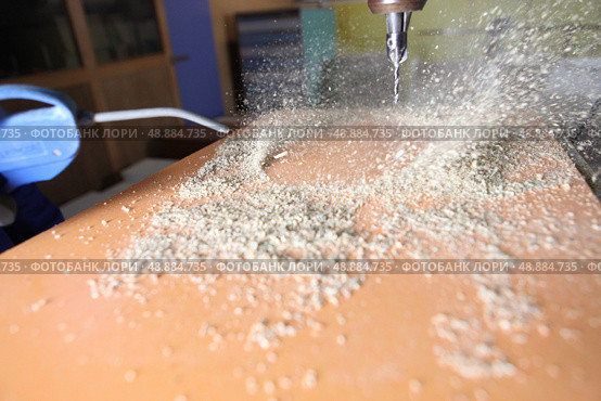 Saw dust caused by drilling. Стоковое фото, агентство Ingram Publishing / Фотобанк Лори