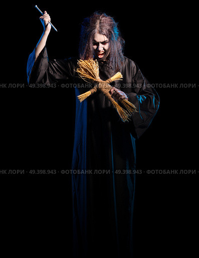 Scary witch isolated on black version. Стоковое фото, агентство Ingram Publishing / Фотобанк Лори