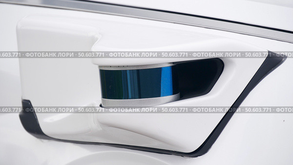 Self-driving vehicle with mounted lidar sensor, close-up shot. Редакционное фото, фотограф Семён Прудий / Фотобанк Лори