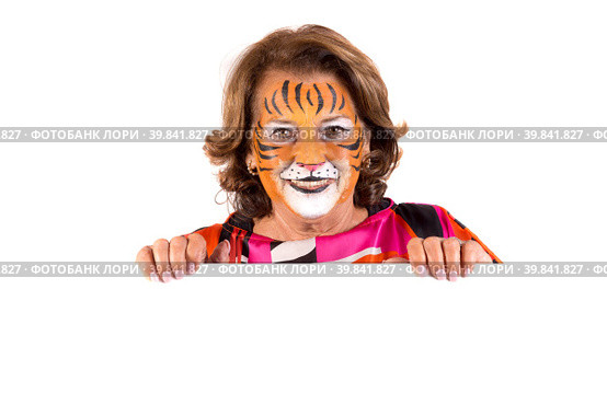 senior woman with tiger face-paint. Стоковое фото, фотограф Luis Louro / PantherMedia / Фотобанк Лори