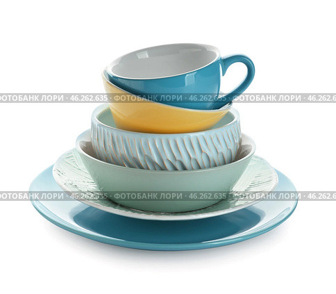 Set of stylish dinnerware on white background. Стоковое фото, фотограф Pixel_shot / Фотобанк Лори