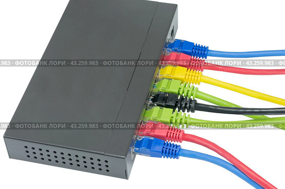 Сетевой коммутатор с подключенными разноцветными сетевыми кабелями. Closeup of network cables connected to router on white. Стоковое фото, фотограф Татьяна Д / Фотобанк Лори