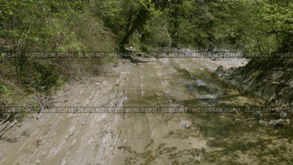 Северный Кавказ. Горная река Жане весной. The North Caucasus. Mountain river Zhane in the springtime. Стоковое видео, видеограф Евгений Романов / Фотобанк Лори