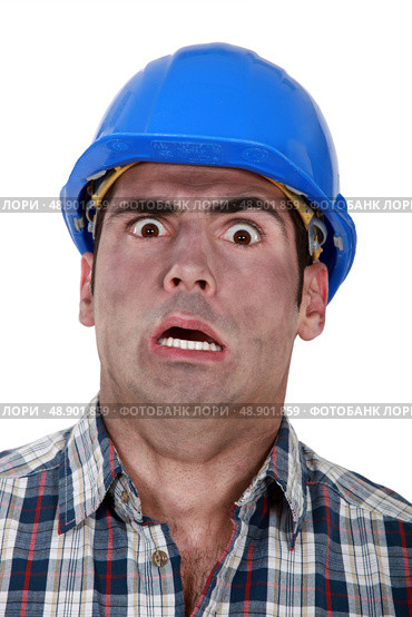 Shocked builder covered in soot. Стоковое фото, агентство Ingram Publishing / Фотобанк Лори