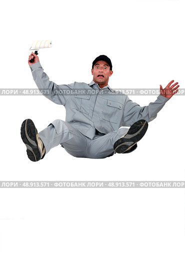 Shocked painter falling backwards. Стоковое фото, агентство Ingram Publishing / Фотобанк Лори