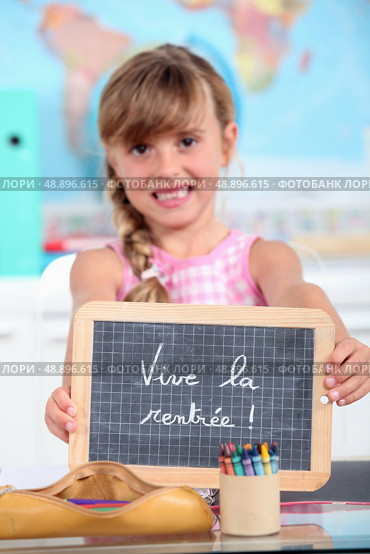 Show girl in school board. Стоковое фото, агентство Ingram Publishing / Фотобанк Лори