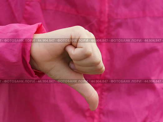 Sign language. Thumb down. Стоковое фото, фотограф YuryKara / Фотобанк Лори