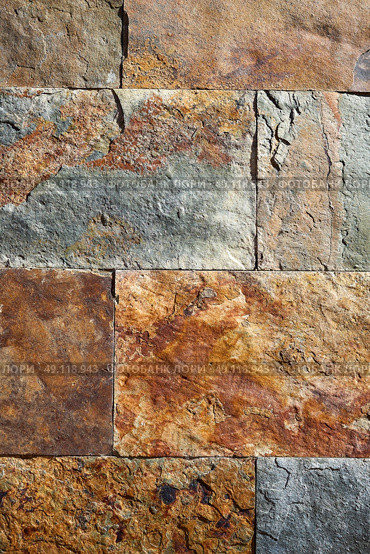 Slate stone colorful texture tiles with red rusted yellow and green blue tones. Стоковое фото, агентство Ingram Publishing / Фотобанк Лори