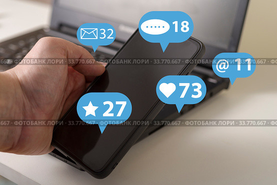 Social media marketing SMM, likes, followers and comment on internet, online business, hands typing on computer blue tone. Стоковое фото, фотограф Григорий Алехин / Фотобанк Лори