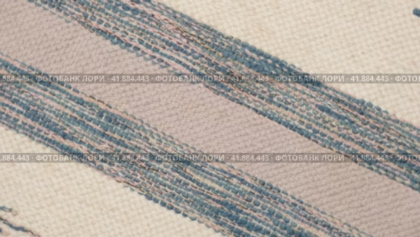 Soft Knitted Woolen Detailed Texture. Natural Fabric Closeup Knit Pattern. Striped Knitwear, Warm Cashmere Surface. Rotation, Macro. Cozy Textile Background. Clothes Production. Melange Yarn. 4K Shot. Стоковое видео, видеограф Марина Демидюк / Фотобанк Лори
