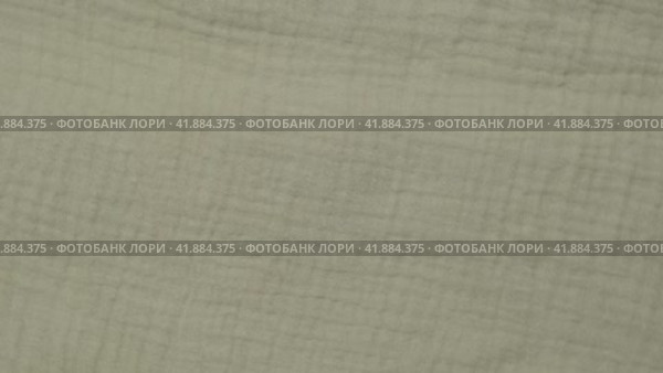 Soft Muslin Detailed Texture. Natural Cotton Fabric Closeup Pattern. Khaki Green Light Chintz Surface. Rotation, Macro. Cozy Textile Background. Clothes Production. Melange Yarn. 4K Shot. Стоковое видео, видеограф Марина Демидюк / Фотобанк Лори