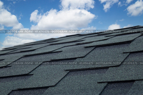 Soft roof, flexible shingles. Installation of soft tiles on the roof. Стоковое фото, фотограф Александр Поташев / Фотобанк Лори