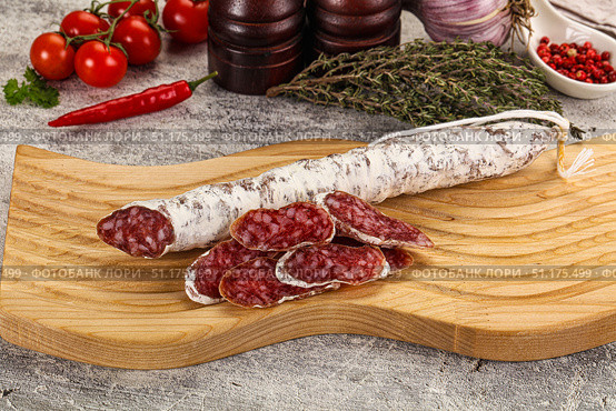 Spanish dry Fuet sausages snack. Стоковое фото, фотограф Андрей Старостин / Фотобанк Лори