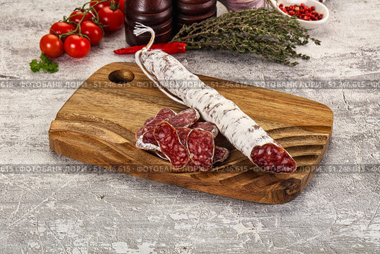 Spanish dry Fuet sausages snack. Стоковое фото, фотограф Андрей Старостин / Фотобанк Лори