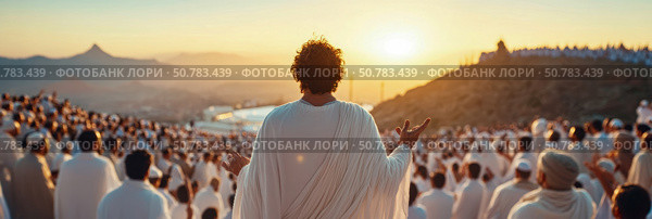 Spiritual Leader Addressing a Congregation at Sunset on a Mountaintop. Стоковое AI-изображение, AI-художник Данила Большаков / Фотобанк Лори