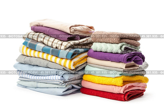 stack of clothing isolated on white. Стоковое фото, фотограф Сергей Толмачёв / Фотобанк Лори